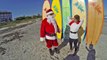 Surfing Santas Cocoa Beach - Santa falling leg lift with Anna Lusk