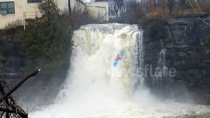 Kayaking over Brownville waterfall