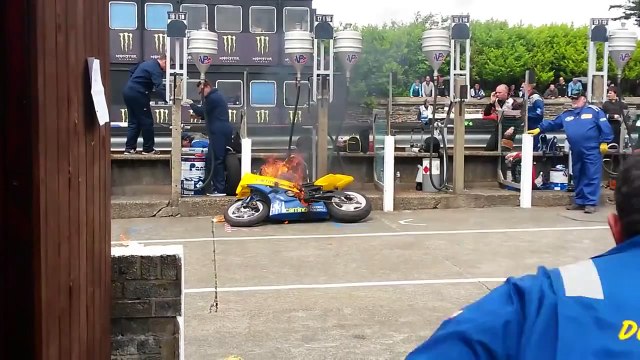 Rider and mechanic engulfed in flames at TT motorcycle race