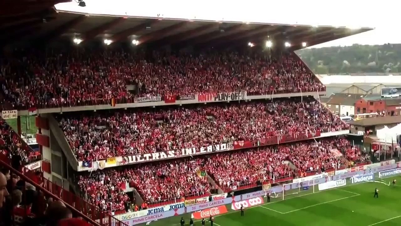 Fans launch masses of toilet roll at football pitch