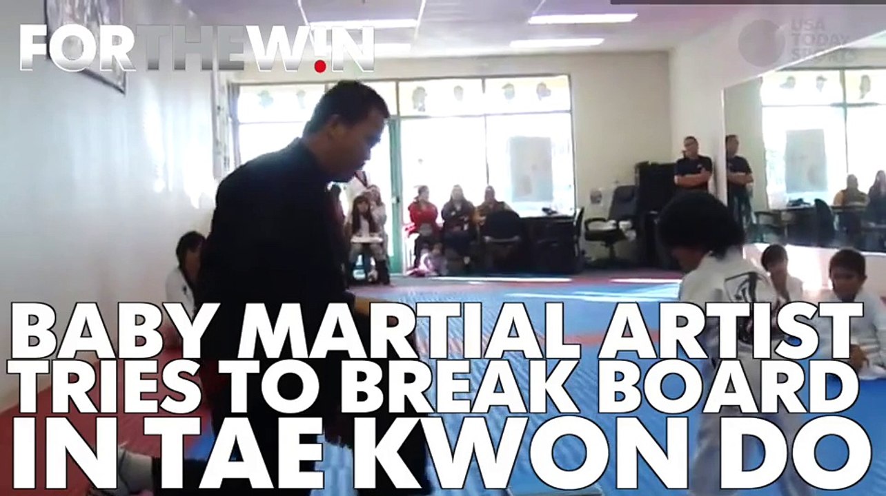 Tae kwon do baby won't give up, breaks a board