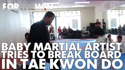 Tae kwon do baby won't give up, breaks a board