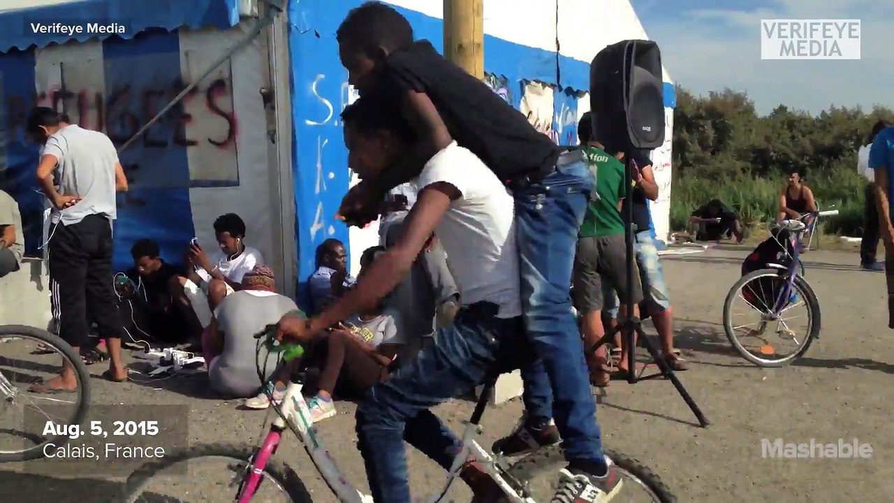 The man who helps the stranded Calais migrants phone home