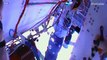 Russian cosmonauts wash windows on outside of Space Station during spacewalk