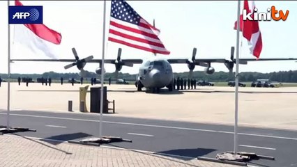 First MH17 bodies arrive in grieving Netherlands