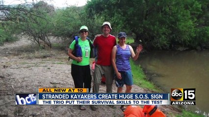 Stranded kayakers create huge "S.O.S" sign