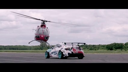 Aerobatic Helicopter Chases Drifting Race Car