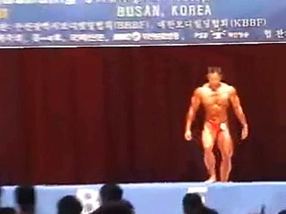 Asian Junior Bodybuilder posing routine