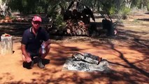 Outback Travel Tips: Boiling a bottle of water on camp fire