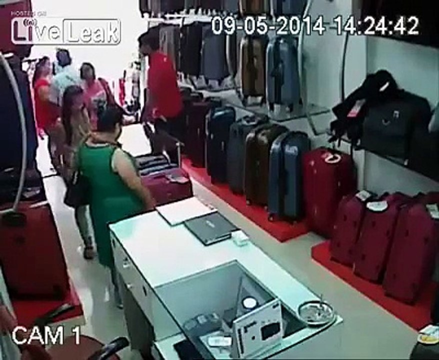 LiveLeak - Thief Helps Herself to a Handful of Cash-copypasteads.com