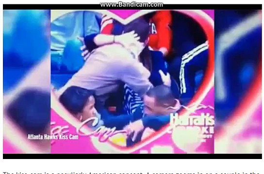 Kiss Cam Beer Fail! Couple kiss, and beer is spilled ALL OVER another couple - but was it staged?