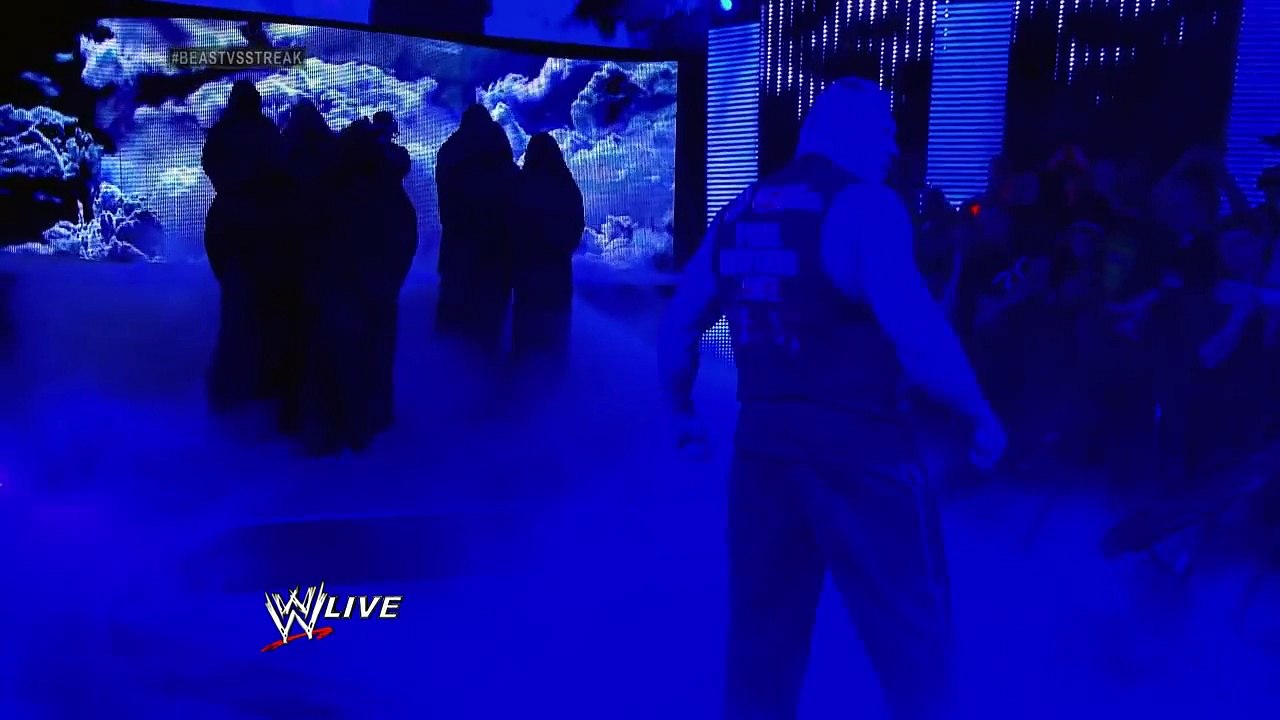 Undertaker rises from a coffin to attack Brock Lesnar- Raw_ March 24_ 2014