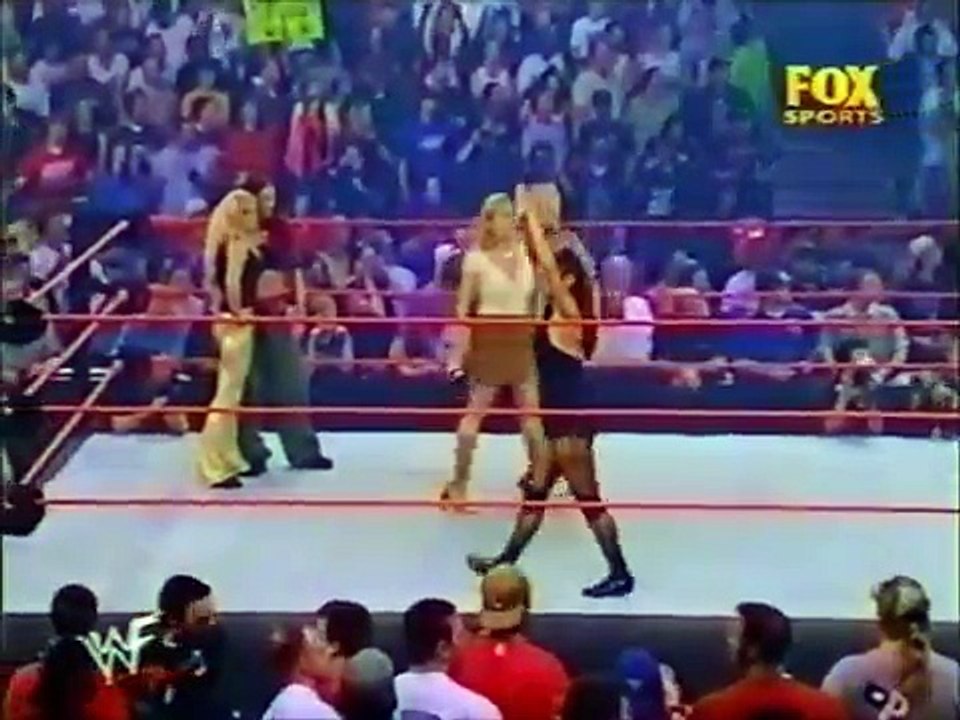 Lita & Trish Stratus vs Ivory & Molly Holly.