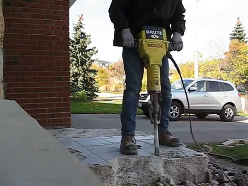 Jackhammering concrete