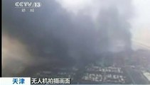 Au lendemain de l'explosion, un panache de fumée noircit le ciel de Tianjin