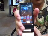 ALEX shows Japanese High Tech Cell phone in OSAKA.