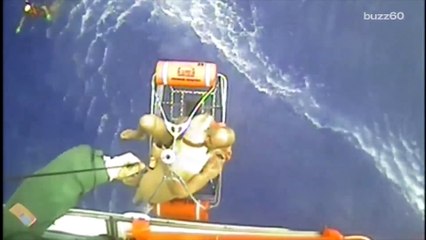 Coast Guard rescues three men and a dog from life raft