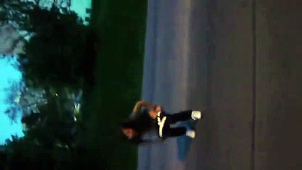 Dorisz pissing on the road