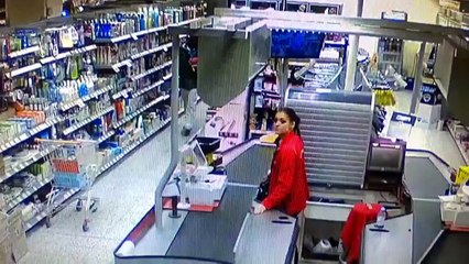 Female Store Cashier Prevents Shoplifting