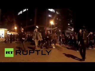 Protesters attack banks after police crackdown on anarchists in Barcelona
