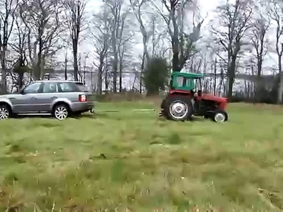 Range Rover Sport vs. Tractor