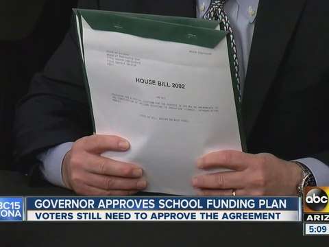 Arizona governor approves school funding plan