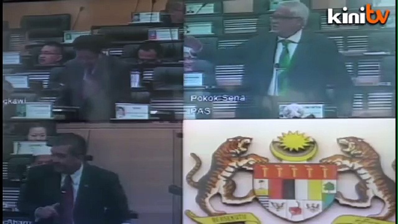 Tension in Parliament as Pakatan, BN MPs face-off