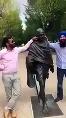 Indians Slap Mahatma Gandhi Statue With Shoes