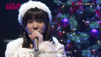 泣きながら微笑んで