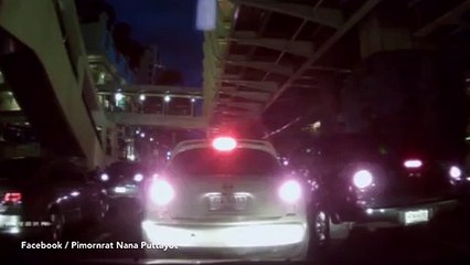 Bangkok blast- man stuck in traffic records on phone