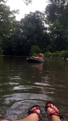 Woman s Inner Tube Pops Underneath Her