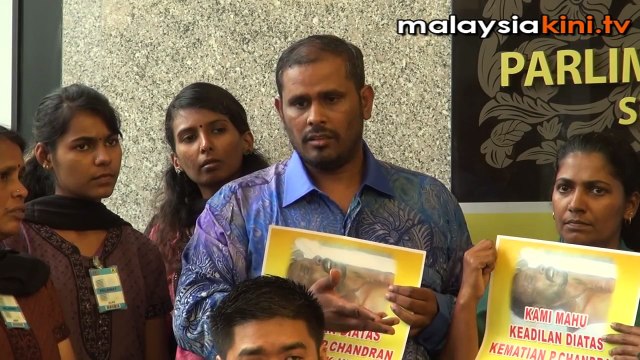 Police 'extorted' wife of death-in-custody victim