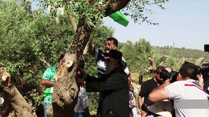 Palestinian Christians protest controversial barrier in the WB
