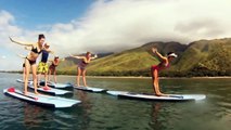 Sun Salutations on the water!  Sup Yoga with Dashama