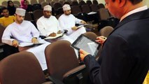 Tahseen Arshi using Interactive Whiteboard iPad app at Majan College, Oman
