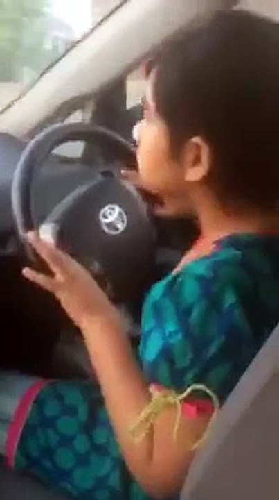 Car in hands of kids
