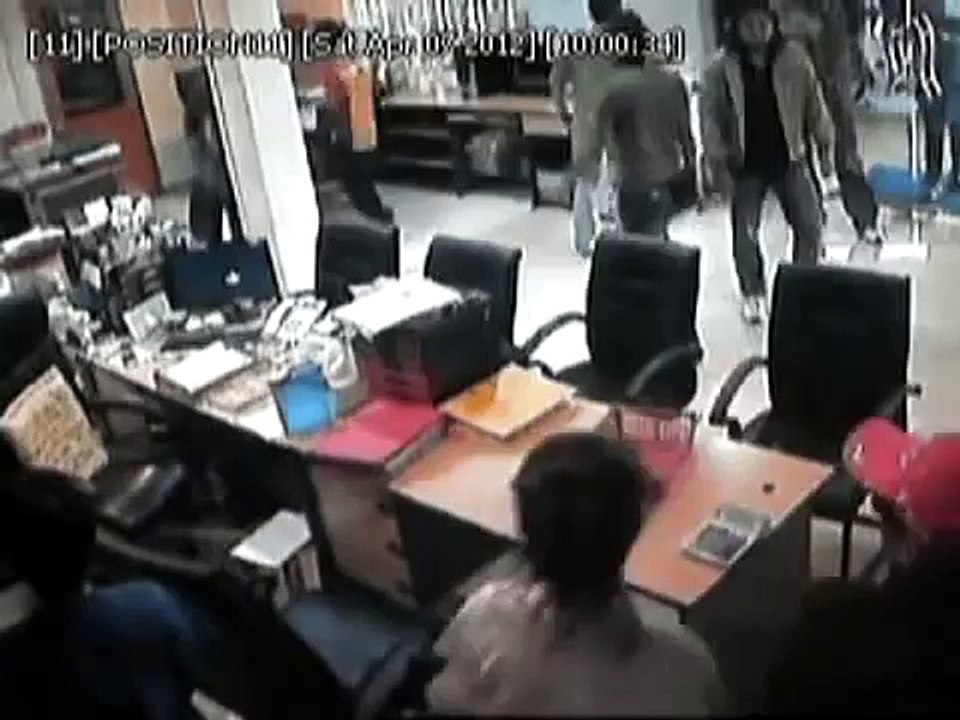 CCTV shows disgruntled mob attacks used car dealer