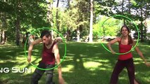 Hula Hoop Tutorial: The Rising Sun with Marria and Zach from Ninja Hoops!
