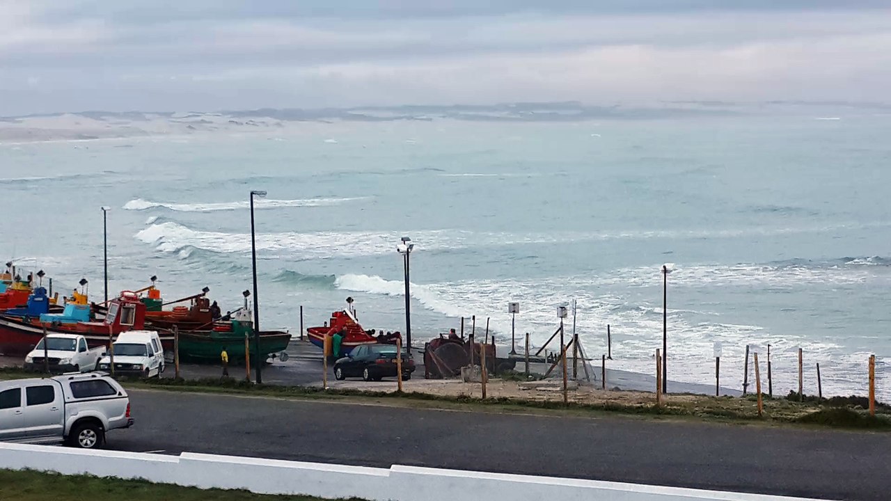 Launching a fishing boat with a tractor