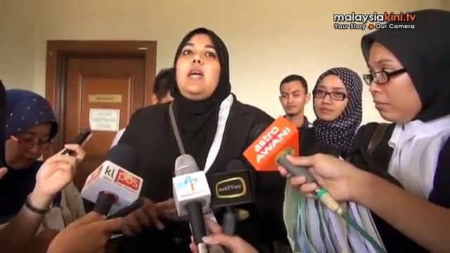 Student activist charged with obstructing police