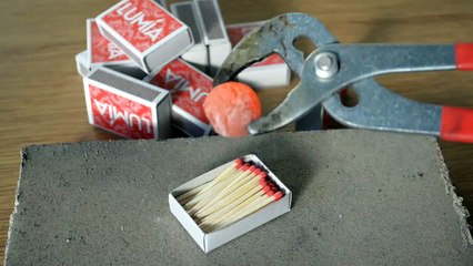 Hot metal ball on box of matches - experiment