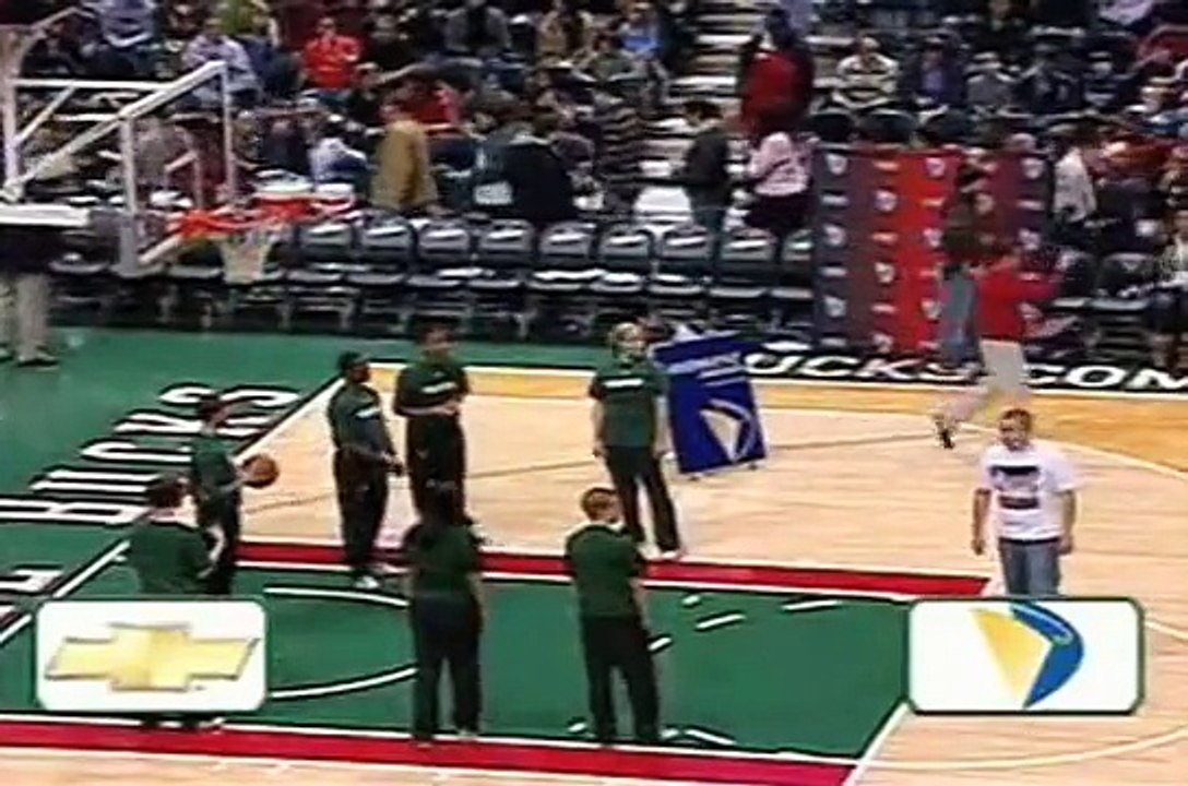 Bucks fan sinks half court shot to win 2008 Chevy Malibu