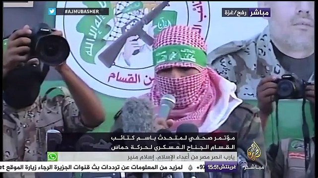 كتائب القسام تنظم عرضا عسكريا في رفح الفلسطينية بالقرب من الحدود المصرية