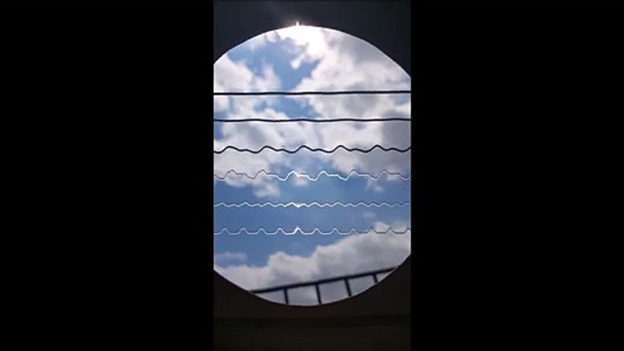 Man filmed himself playing guitar with gopro inside the instrument! Watch the strings vibrations