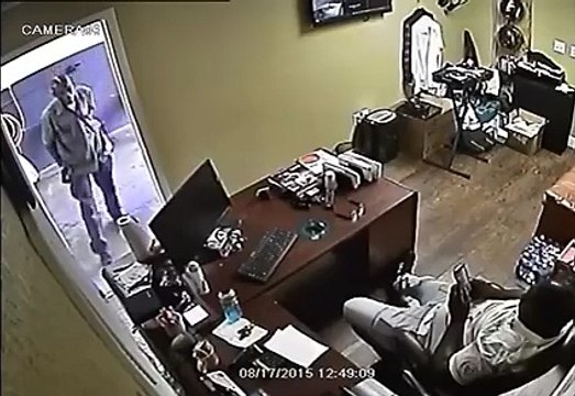 Store Owner Takes Gun From Armed Robbers And Shoots Back