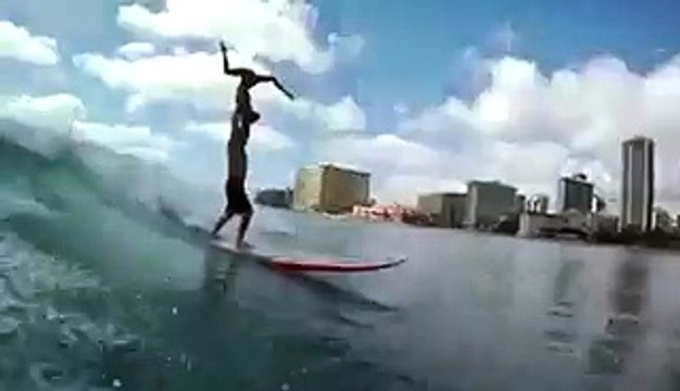 Amazing Water surfing by young couple at Miami Beach