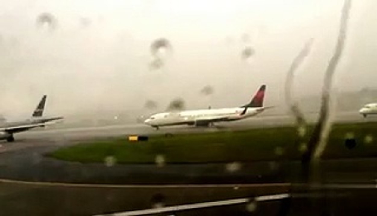 Delta Airlines Jet Struck by Lightning bolt in Thunder storms at Atlanta Airport USA