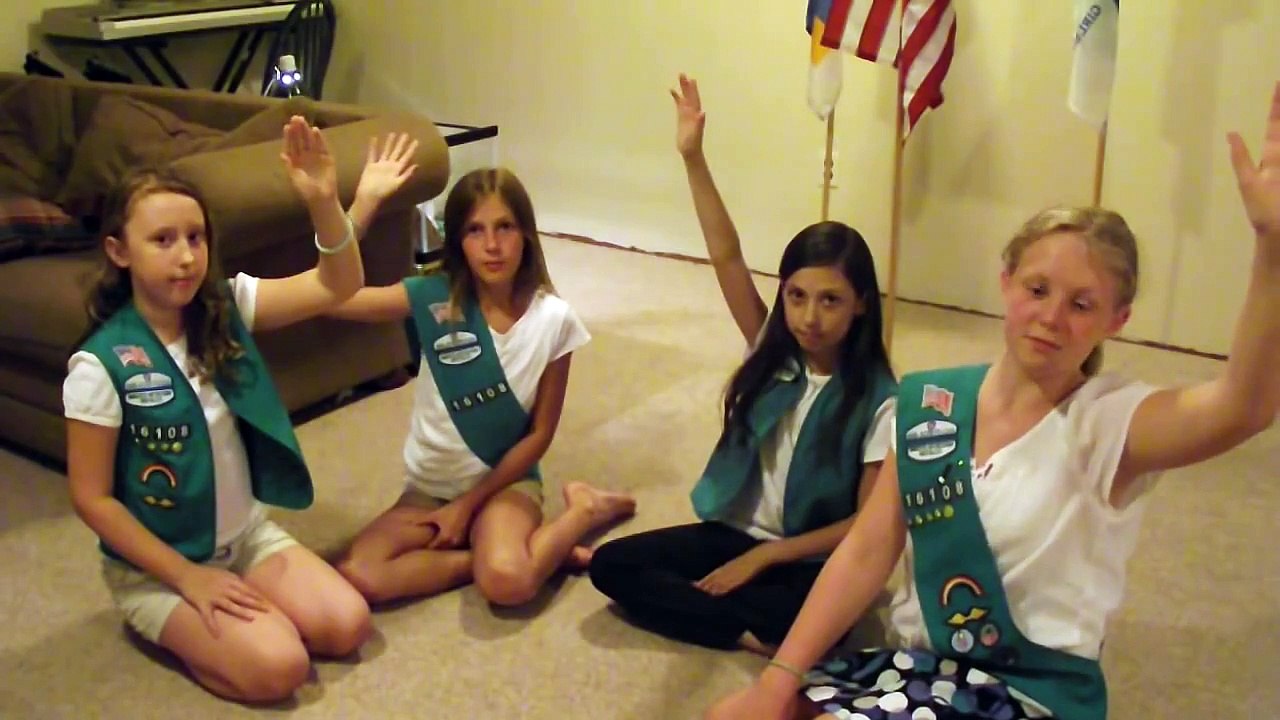Girl Scout hand signals, handshake, promise and law