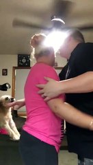 Jealous dog wants to be included in family hug