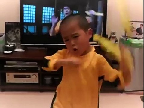 A Little Bruce Lee Sounds ,Moves and Work Those Nijha Chucks Just Like The Original Bruce Lee .Wow,Great Job Watch Out He s Dangerous